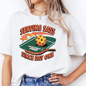 Funny Pickleball Shirt for Women, Serving Sass Since Day One Tee, Cute Paddle Ball Shirt, Sassy Pickleball Gift, Game Day T-Shirt