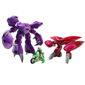 May include: Three toy figures: a large purple robot with clawed feet, a red and pink futuristic vehicle, and a green motorcycle with a small rider. The toys are set against a white background.