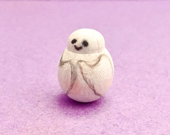 Tiny wood ghost