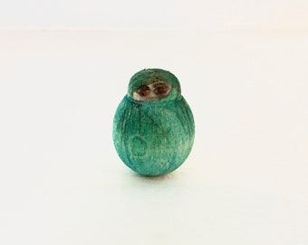 Tiny wood doll in jade green