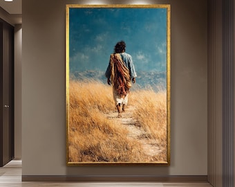 May include: A framed artwork depicts a figure walking away on a path through tall, golden grass. The person wears a blue tunic and a draped orange and brown cloth, set against a blue sky. The artwork is in a gold frame.