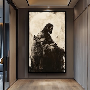 Può includere: Un'opera d'arte incorniciata in tonalità seppia raffigura una figura seduta con capelli lunghi e barba, accompagnata da un lupo. Lo sfondo presenta una grande forma circolare luminosa. L'opera è esposta in un corridoio moderno.