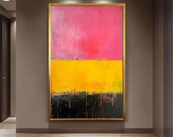 May include: Abstract painting with a gold frame. The artwork features three horizontal bands of color: a vibrant pink at the top, a bright yellow in the middle, and a textured black at the bottom. The painting is displayed in a hallway.