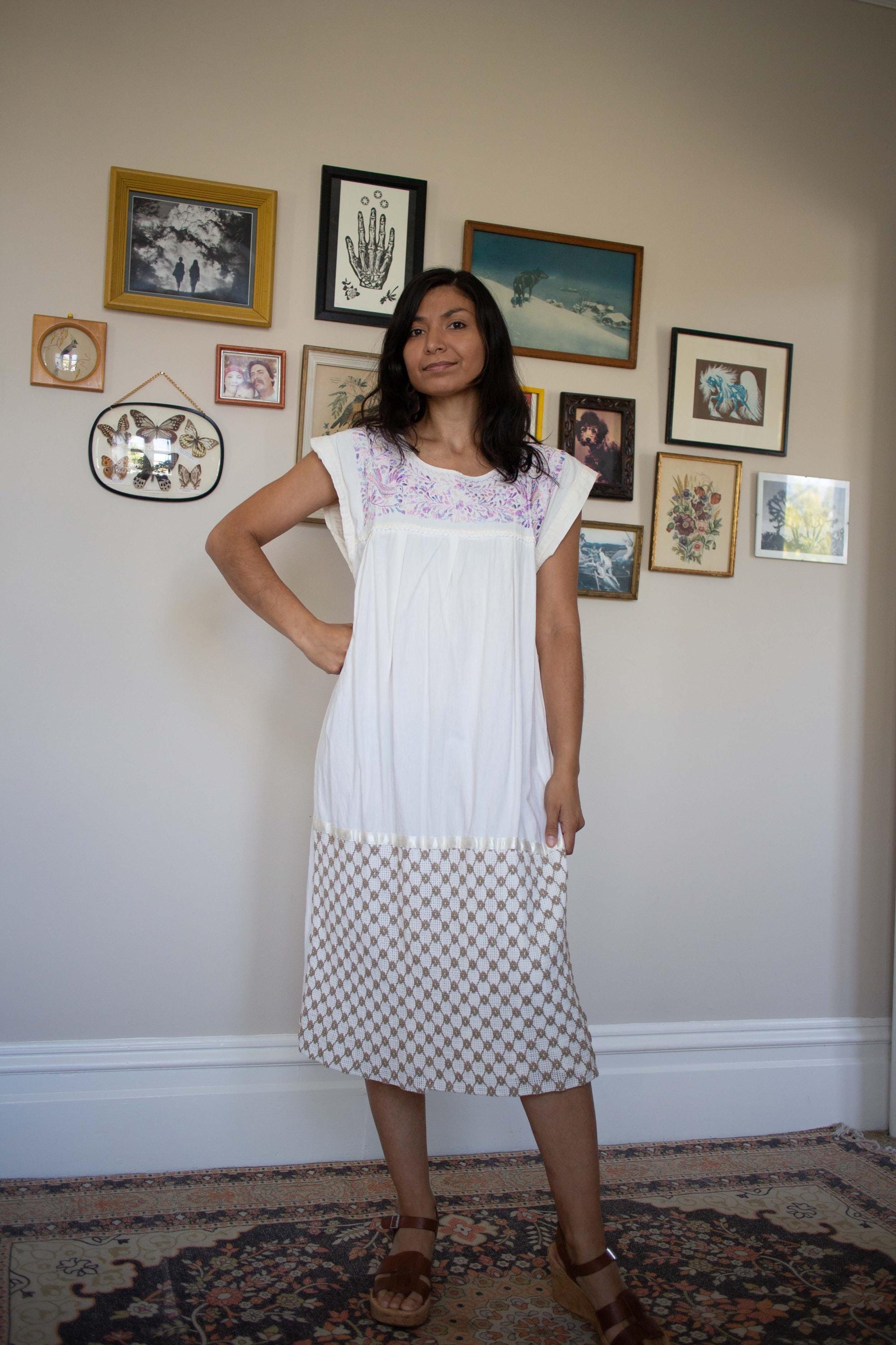 vintage pin up dresses Unique Vintage Black Criss Cross Halter Rita Flare Dress