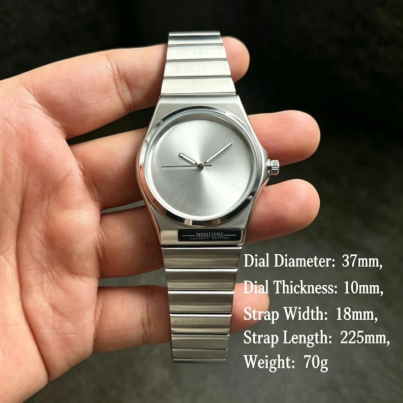 May include: A silver wristwatch with a minimalist design. The watch features a round face with a simple dial and a metallic band. The dial diameter is 37mm, thickness is 10mm, strap width is 18mm, strap length is 225mm, and the weight is 70g.