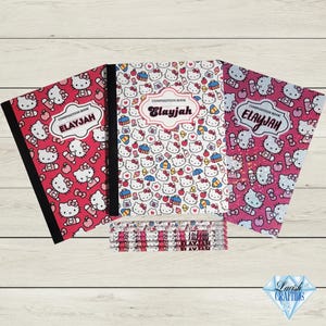 May include: Composition books and pencils featuring a Hello Kitty design. The notebooks have a red, white, and pink color scheme with the name "Elayjah" on the cover. The pencils are also decorated with the same design.