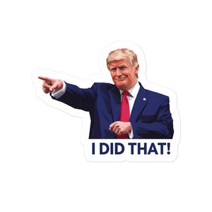 May include: A sticker featuring a cartoon illustration of a man in a blue suit and red tie pointing to the left. The text "I DID THAT!" is printed in white at the bottom of the sticker.