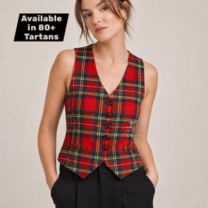 May include: A sleeveless vest featuring a red, green, yellow, and blue tartan plaid pattern with a V-neckline and five black buttons down the front. The garment includes two small welt pockets at the waist and text stating Available in 80+ Tartans.