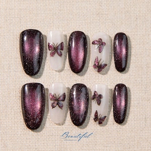 Fioletowe paznokcie typu „kocie oko”: wzór gwieździstego nieba, krótka długość