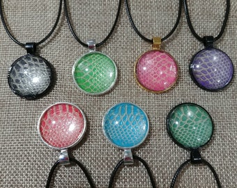 1" Round Snake Shed Pendant with 20" cord. #9