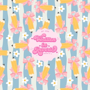 May include: A repeating pattern featuring yellow pencils with pink bows and white daisies on a light blue and white striped background. A pink oval in the center has the text "Written in Reverie Design Co."