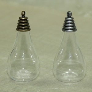 Set of Five Teardrop Blown Glass Globes with Brass and Silver Pendant Lids. GLB5012