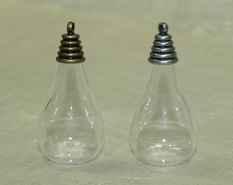 Set of Five Teardrop Blown Glass Globes with Brass and Silver Pendant Lids. GLB5012