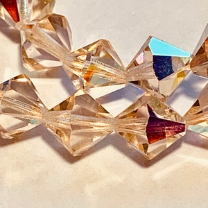 Vintage Swarovski Rosealine AB 10mm Bicones