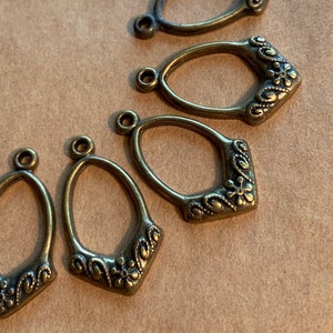 Group of 12 Vintage Brass Dangles with Flower Design