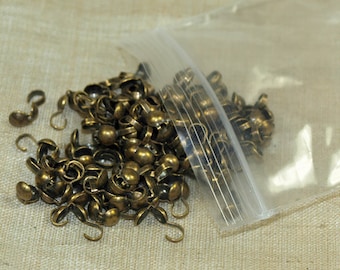 100 punte per perline a conchiglia in ottone; MET1044