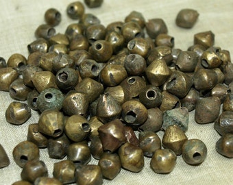 Bag of 8 Antique Brass/Bronze Bicones from Northern Nigeria, Made in the 1900s. MET1000