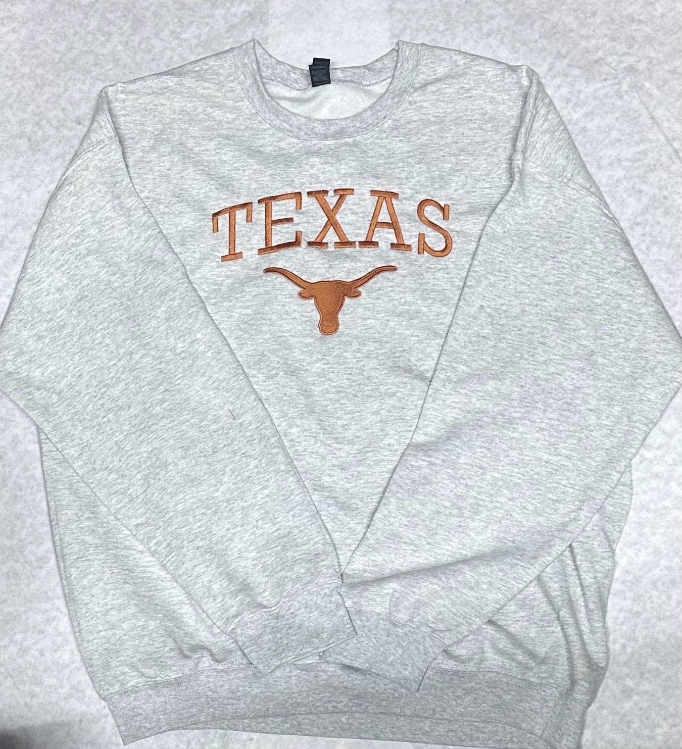 University of Texas embroidered sweatshirt.