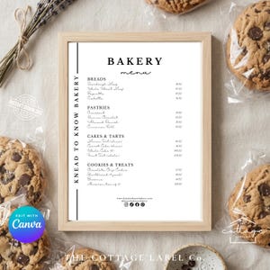 May include: A bakery menu in a light wood frame, surrounded by chocolate chip cookies in clear packaging. The menu lists breads, pastries, cakes, tarts, cookies, and treats. The text "KNEAD TO KNOW BAKERY" is on the left side of the frame.