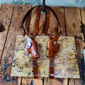 Premium Leather Vertical Roto Double Shoulder Holster for all Gun Models- Hand Molded Custom Shoulder Gun Holster with tie down strap. product logo