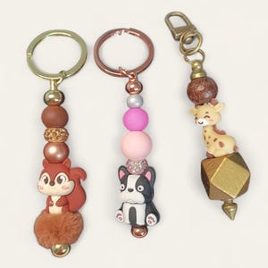 Hund, Streifenhörnchen & Giraffe Taschenanhänger/Schlüsselanhänger.