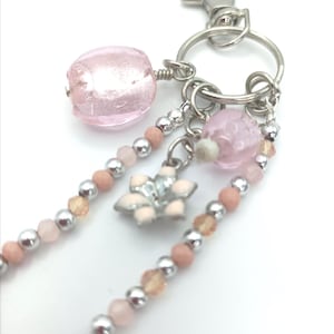 Pink bag charm.