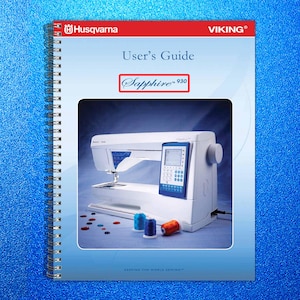 May include: A spiral-bound user's guide for a Husqvarna Viking Sapphire 930 sewing machine. The cover features the Husqvarna and Viking logos, with the title "User's Guide" and the model name. The image inside shows the white and blue sewing machine.