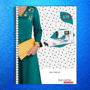 May include: A spiral-bound user manual for the Bernette b79 sewing and embroidery machine. The cover features a person in a green dress with floral embroidery holding a yellow clutch, alongside a white sewing machine and the text b79.