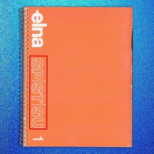 May include: An orange spiral-bound notebook with the word "elna" in white at the top and the letters "SPSTSU" in a vertical rectangle. The number "1" is at the bottom right corner. The background is blue.