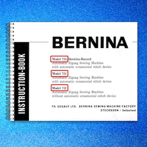 May include: A white instruction book with the word "BERNINA" in large black letters. The book lists models 730, 731, and 732, automatic zigzag sewing machines. The book is spiral-bound with a black spine and the words "INSTRUCTION-BOOK".