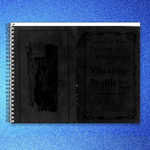 May include: A black spiral-bound notebook with white wire binding. The open pages display text and illustrations. The right page reads "Instructions for Working Frister & Rossmann's Vibrating-Shuttle". The notebook is on a blue surface.