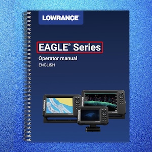 May include: A spiral-bound manual with the text "LOWRANCE" and "EAGLE Series" in red. Below the text are three black electronic devices with screens displaying maps and sonar readings. The manual is on a blue background.