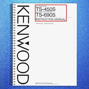 May include: A white instruction manual with the word "KENWOOD" printed vertically in large black letters. The manual includes the text "HF TRANSCEIVER TS-450S ALL MODE MULTI BANDER TS-690S INSTRUCTION MANUAL". The manual is spiral-bound.