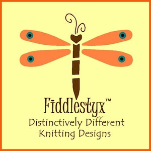 May include: A stylised orange dragonfly with brown wings and blue eyes on a yellow background. The text "Fiddlestix&trade; Distinctively Different Knitting Designs" is below the dragonfly.