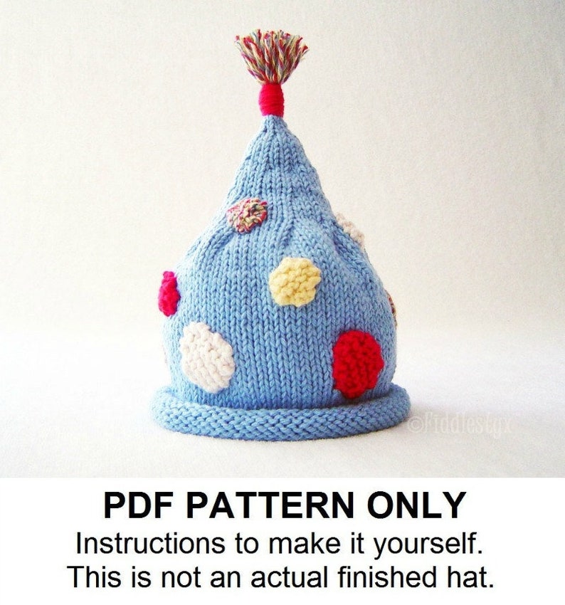 May include: A PDF pattern for a blue knitted hat with colorful polka dots and a multi-colored tassel on top. The text "PDF PATTERN ONLY" is written below the hat. The text "Instructions to make it yourself. This is not an actual finished hat." is written below the text "PDF PATTERN ONLY".