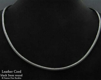 May include: A black leather cord necklace, 3 mm round, on a black background.  Leather Cord black 3mm round © Paxton Fine Buckles