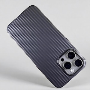 May include: A dark gray phone case with a ridged, textured design. The case features a camera module with three lenses and a flash. The case is designed to protect the phone from scratches and impacts.