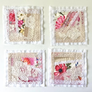 May include: Four square fabric coasters featuring layered patchwork designs. Each coaster incorporates floral patterned cotton fabric, beige lace trim, and white embroidered floral lace appliqués with raw, frayed edges on a white base.