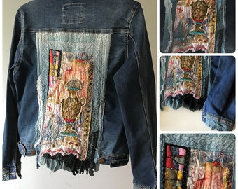 Upcycled jean jacket hand stitched with unique one of the kind embroidered details