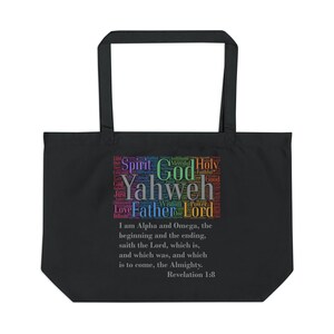 May include: Black tote bag with a colorful word cloud design featuring the words "Spirit", "God", "Yahweh", "Father", and "Lord". The bag also includes the text "I am Alpha and Omega, the beginning and the ending, saith the Lord, which is, and which was, and which is to come, the Almighty. Revelation 1:8."