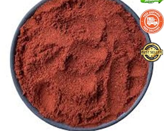 May include: A bowl of red sandalwood powder. The image includes the text "Red Sandalwood Powder" and "Lacuna Medicinals". There are also badges that say "100% Natural products", "Free Shipping", and "Best Seller".