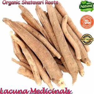 May include: A collection of tan-coloured organic Shatavari roots, with a slightly rough texture. The image features the text "Organic Shatavari Roots" and "Lacuna Medicinals". Additional labels state "100% Natural products", "Free Shipping", and "Best Seller".