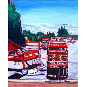 May include: A painting of a red airplane with the number 152 on the side, parked next to a red can of beer. The can has the text "Sinke Sathe Red" and "Denali Brewing Talkeetna, Alaska" on it. The background is a blue sky with white clouds.