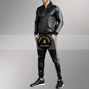 May include: Black leather track suit with white stripes on the sleeves and legs. The jacket has a zipper closure and the pants have an elastic waistband. The text "FOUR SEASONS LEATHER" is in a circular logo.