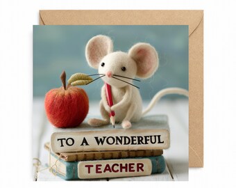 May include: A greeting card featuring a felt mouse holding a pencil, sitting atop books that read "TO A WONDERFUL TEACHER." A red apple sits beside the mouse. The card is inside a brown envelope.