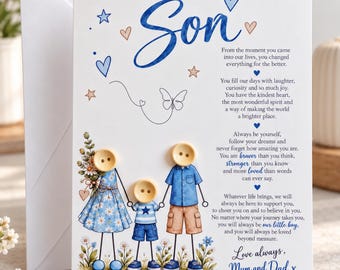 May include: A white greeting card titled To Our Son featuring a printed illustration of a family of three with button heads. The card includes blue and brown text, blue hearts, stars, and a butterfly graphic, accompanied by a matching white envelope.