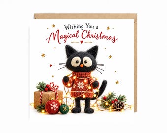 May include: A square greeting card featuring a black felt cat wearing a red patterned sweater, holding a string of glowing fairy lights. The text reads Wishing You a Magical Christmas, surrounded by small gold stars and red hearts.