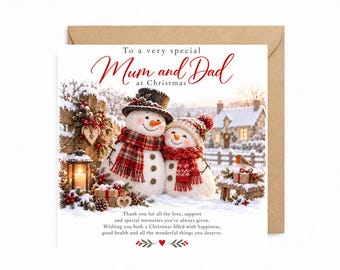 May include: A square Christmas greeting card featuring two snowmen wearing plaid scarves and hats, standing in a snowy landscape with a lantern, gifts, and a robin. The text reads: To a very special Mum and Dad at Christmas, followed by a message of love and support.