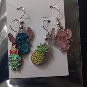 Stitch and angel earrings