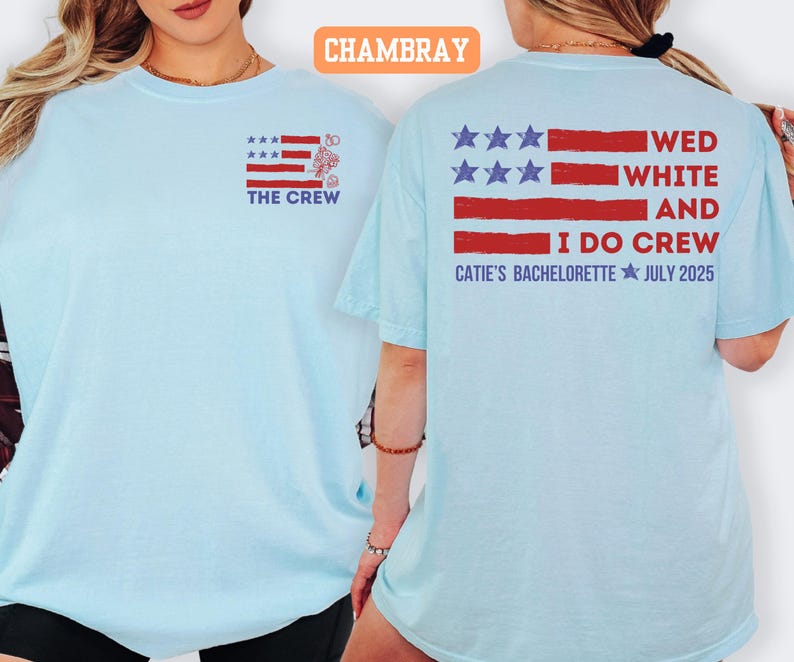 May include: Light blue t-shirts with a patriotic design. The front of the shirt features a red, white, and blue graphic with the text "THE CREW." The back of the shirt has a similar design with the text "WED WHITE AND I DO CREW CATIE'S BACHELORETTE JULY 2025."